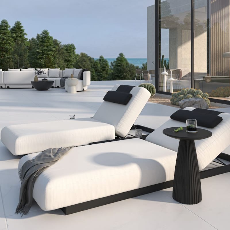 Two Outdoor Loungers in a Backyard