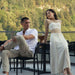 Couple Featured Next to an Afton Outdoor Dining Chair With Black Cord And Black Frame On A Patio