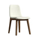 Angled Side View of The Aubrey Side Chair in Monaco Cream Fabric and Walnut Wood Finish