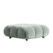 Angled Side View of The Belia Ottoman Modular Sectional Piece With Moonstone Fabric