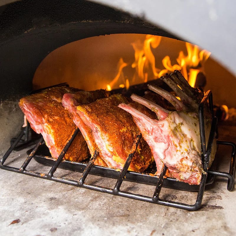 Lamb Cooking In A Chicago Brick Oven Pizza Oven