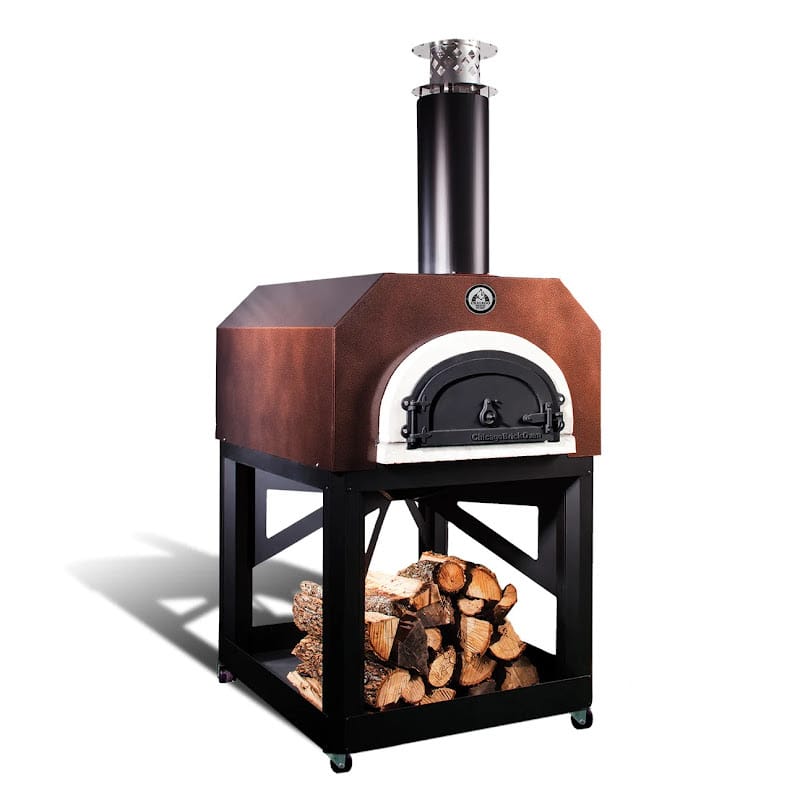 Chicago Brick Oven CBO-750 Mobile Wood Fired Pizza Oven Angled In Copper With Closed Door And Wood Storage