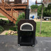 Chicago Brick Oven CBO-750 Mobile Wood Fired Pizza Oven Front View In A Driveway