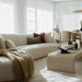 Angled Side View of The Cascadia Coffee Table With Alabaster Concrete Surface in a Living Room