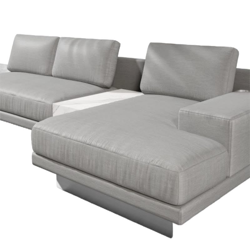 Angle View of the Dresden Outdoor Right Oriented Sectional Sofa In Encino Color With White Calacatta Ceramic Table