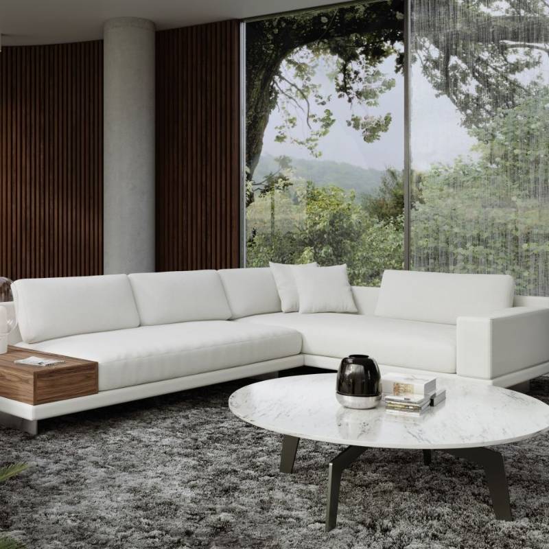 The Evelyn Coffee Table - Round With a White Calacatta Ceramic Surface in a Carpeted Living Room