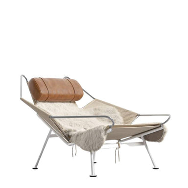 Angled Side View of The Flag Halyard Chair With Trento Morocco Headrest and Sheepskin throw