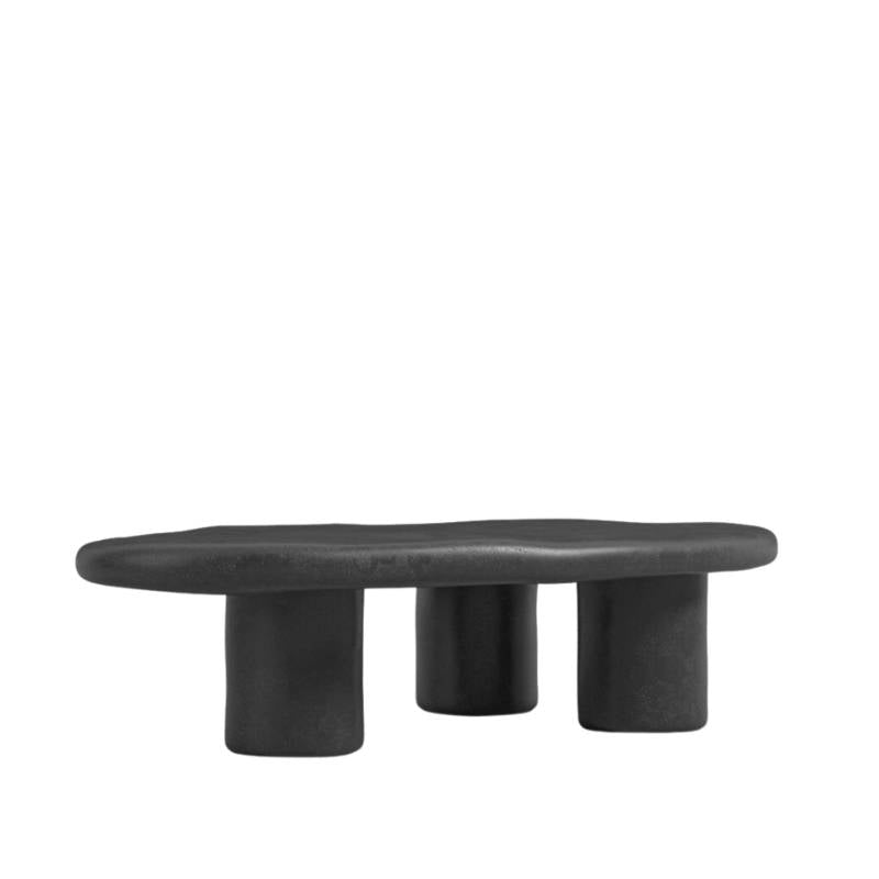 Angled Side View of The Kara Coffee Table With Black Concrete Surface