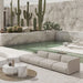 Leia Coffee Table With White Calacatta Ceramic Surface Outdoor In Front Of a Couch