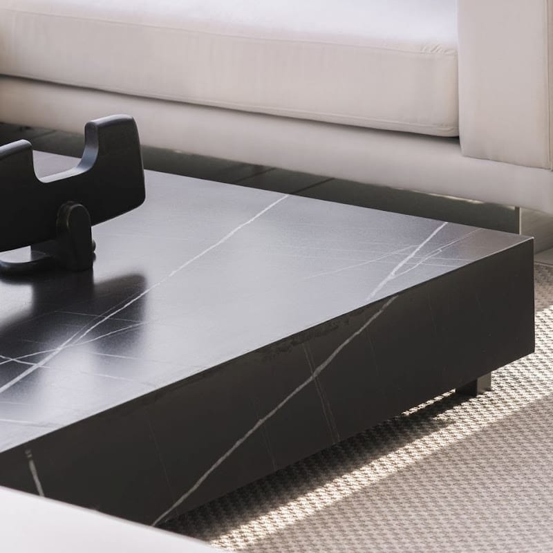 Close Up View of The Liza Coffee Table With Black Pietra Ceramic Surface In a Living Room