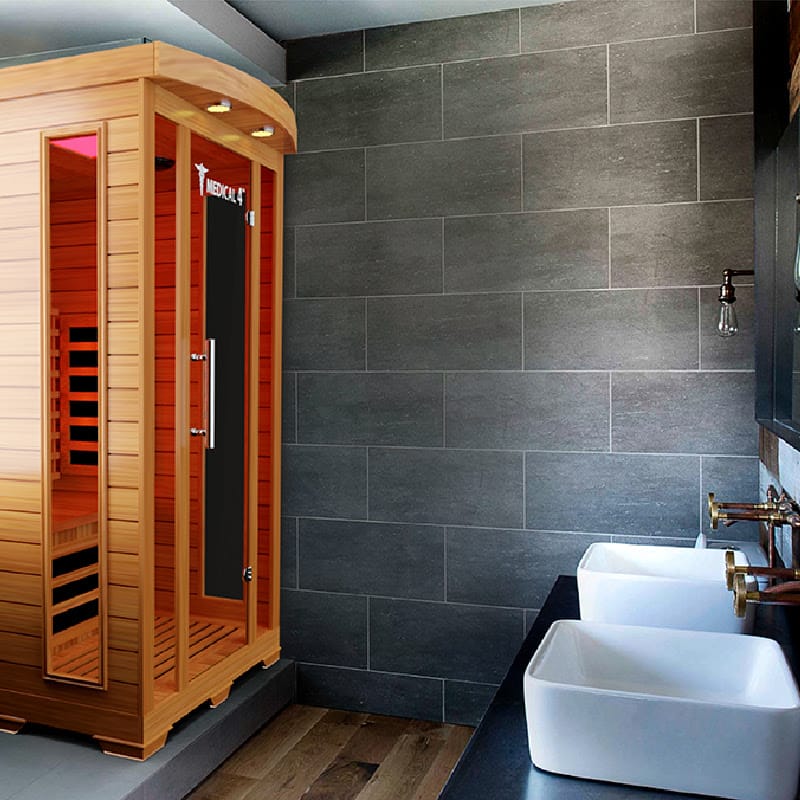 The Medical Saunas Medical 4 Full Spectrum Infrared Indoor Dry Sauna in a Bathroom Across From Sink