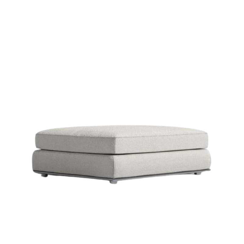 Angled Side View of The Milo 1-Seater Ottoman in Pearl Fabric and Color