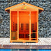 Medical Saunas 4-Person Nature 7 Ultra Full Spectrum Outdoor Hybrid Dry And Steam Sauna On a Wooden Walkway Next To Pool