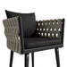 Angled Close Up View Of The Pierre Outdoor Dining Chair In Arcadia Fabric And Black Frame