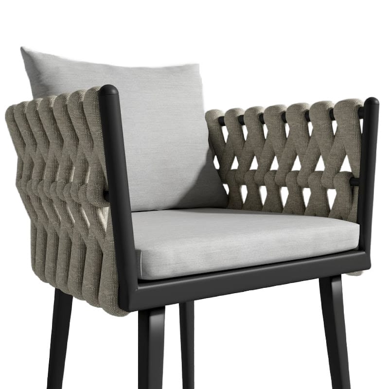 Angled Close Up View Of The Pierre Outdoor Dining Chair In Encino Fabric And Black Frame