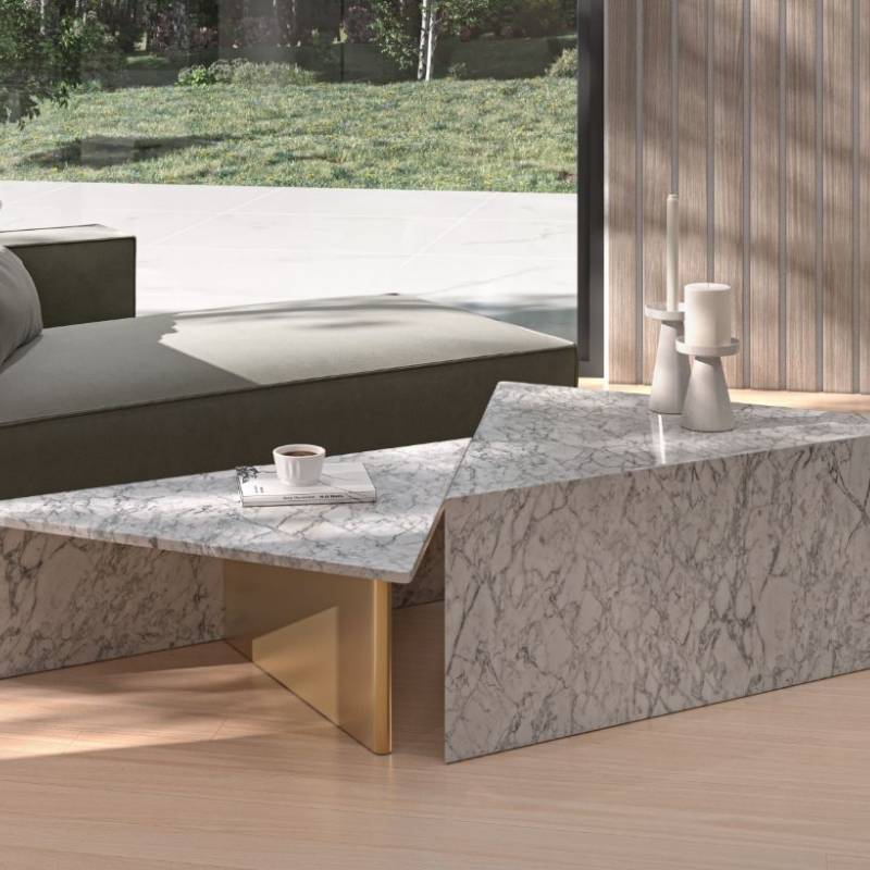 Close Up of The Low Terra Coffee Table in White Marble Placed Next to the High Terra Coffee Table