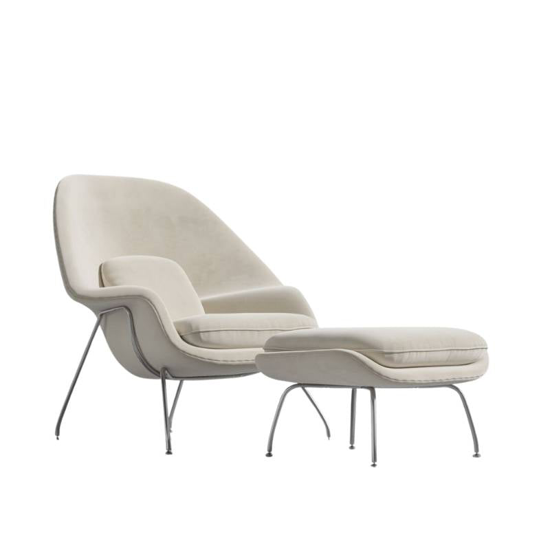 Angled Side View of The Womb Chair and Ottoman in Cloud Fabric