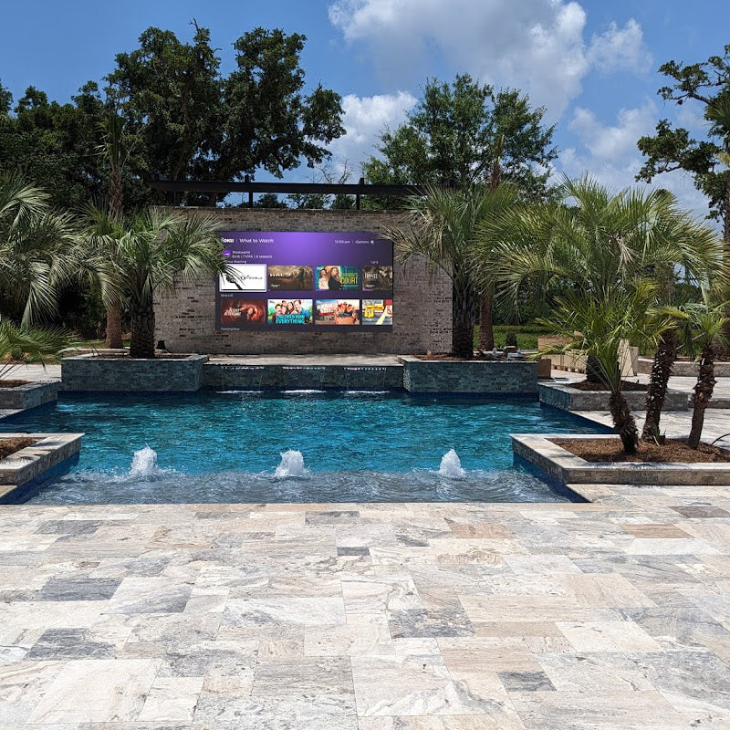 Outdoor Wall Mounted  Yolo TV in Backyard Oasis With Palm Trees