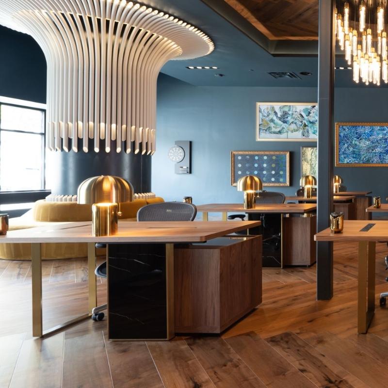 Office Room With Several Augustus Desks With Black Marble Base and Walnut Veneer Desktop Finishes