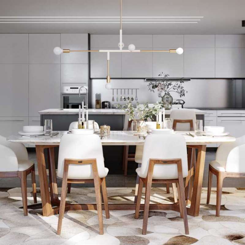 Front Facing View of The Evelyn Dining Table in White Carrara Marble in a Kitchen Dining Area