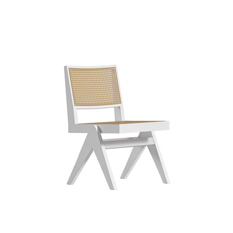 Angled Side View of The Javert Side Chair in White Lacquer and Tan Cane Finish