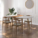 Wide View of The Marcus Dining Table in a White Lacquer With a Walnut Veneer Leaf Extension in a Dining Room