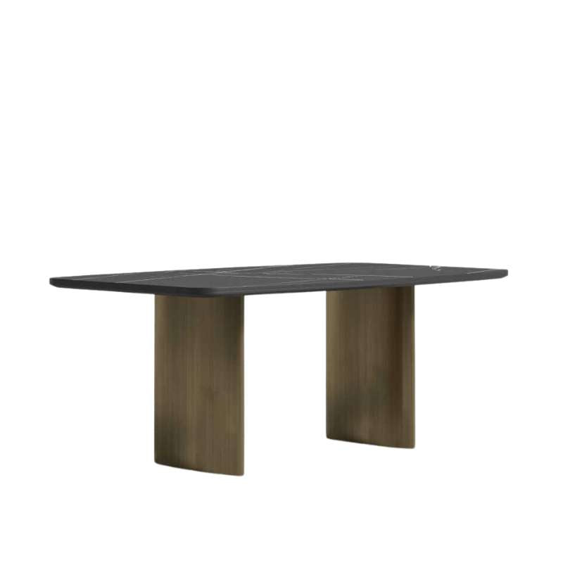 Angled Side View of The Solana Dining Table With a Black Pietra Ceramic Surface and Antique Brushed Brass Base