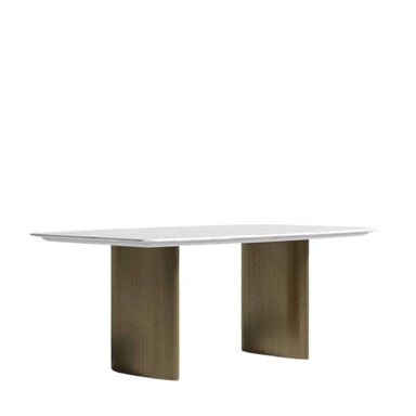 Angled View of The Solana Dining Table With a White Calacatta Ceramic Surface and Antique Brushed Brass Base