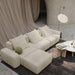 Angled Top Facing View of The Trio Side Table in Natural Oak Veneer Next to a Couch and Coffee Table