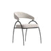 Angled Side View of The Uma Dining Chair in Pearl Fabric and Color